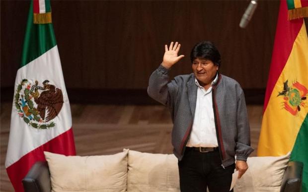 evo-morales-banderas-mexico-bolivia-1574902300182